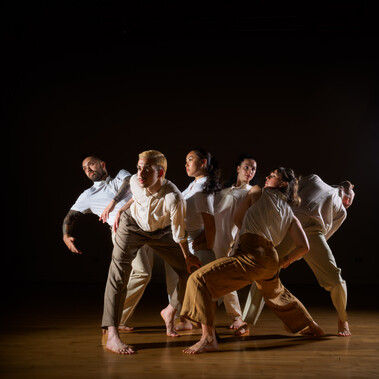 Dancers Joe Darby, Amy Morvell, Luke Brown, Yanki Ki Yau, Coralie Calfond, Ivan Merino Gaspar move as a group.